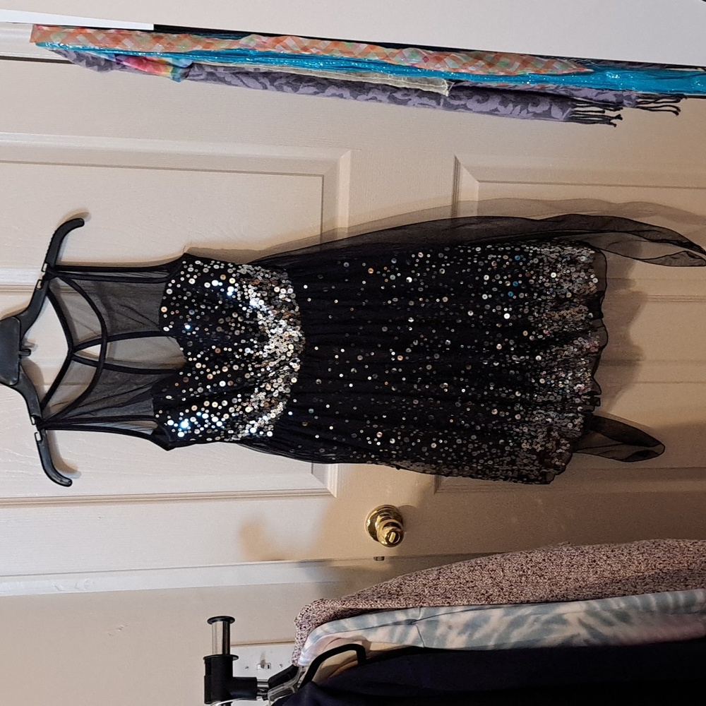 Ruby Rox, 5, Black with silver accents.